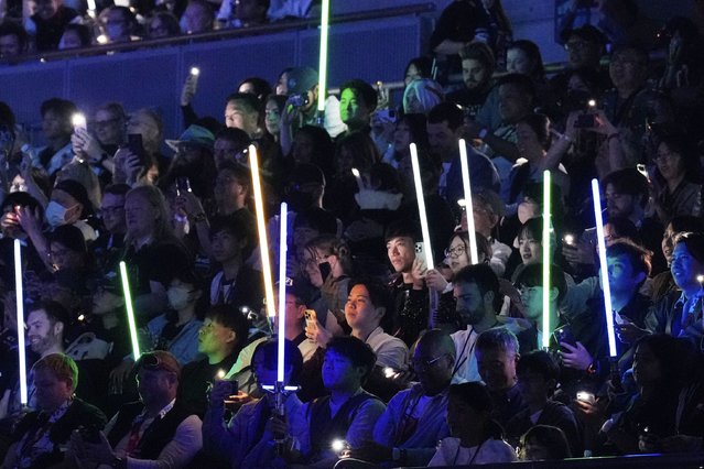 Fans watch opening act during the Star Wars Celebration in Chiba, near Tokyo, Friday, April 18, 2025. (Photo by Hiro Komae/AP Photo)