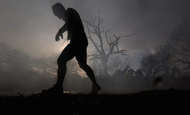 A competitor in action during the Tough Guy Challenge on January 27, 2013 in Telford, England.  (Photo by Ian Walton)