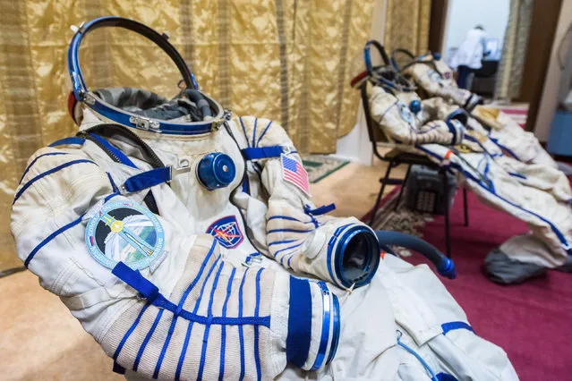 A picture shows spacesuits of members of the International Space Station (ISS) expedition 64, NASA astronaut Kate Rubins and Russian cosmonauts Sergey Ryzhikov and Sergey Kud-Sverchkov, during their final exam at the Gagarin Cosmonauts' Training Centre in Star City outside Moscow on September 23, 2020. The trio is preparing for the launch onboard the Soyuz MS-17 spacecraft from the Russian-leased Kazakh Baikonur cosmodrome on October 14. (Photo by Andrey Shelepin/Russian Space Agency Roscosmos/AFP Photo)