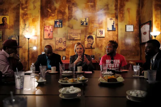 U.S. Democratic presidential nominee Hillary Clinton meets with leaders from the African-American community at Mert's Heart and Soul restaurant in Charlotte, North Carolina, United States October 2, 2016. (Photo by Brian Snyder/Reuters)