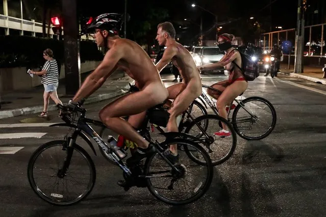 Naked cyclists take part in a protest along Avenida Paulista in Sao Paulo, Brazil, 10 March 2018. Dozens of cyclists cycled in Sao Paulo to denounce the recklessness of some drivers and raise awareness about the hundreds of deaths because of road accidents. (Photo by Fernando Bizerra Jr./EPA/EFE)