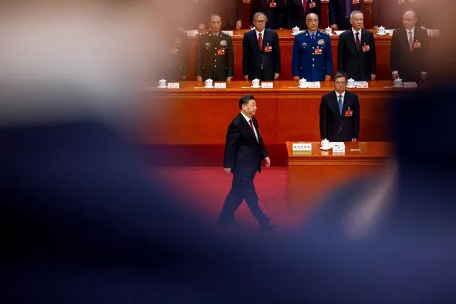 Chinese President Xi Jinping prepares to take his oath during the Third Plenary Session of the National People's Congress (NPC) at the Great Hall of the People, in Beijing, China, 10 March 2023. China holds two major annual political meetings, the National People's Congress (NPC) and the Chinese People's Political Consultative Conference (CPPCC) which run alongside and together are known as “Lianghui” or “Two Sessions”. (Photo by Mark R. Cristino/Pool via EPA)