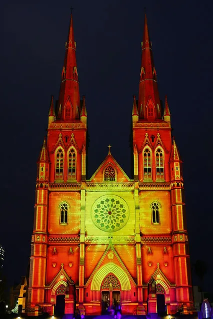 St Mary's Cathedral is illuminated as part of a Christmas lights display in celebration of Christmas on December 19, 2014 in Sydney, Australia. (Photo by Brendon Thorne/Getty Images)