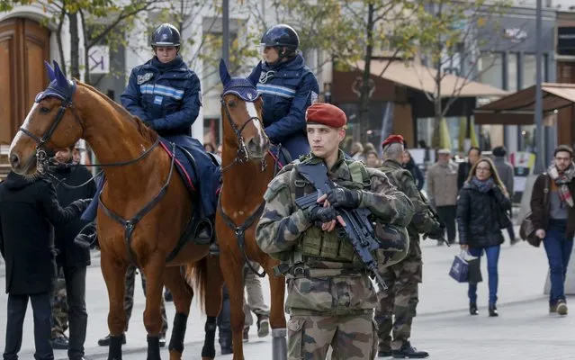 French paratroopers and mounted French police are seen in the center of Lyon, France, November 27, 2015 as the security measures in public places is reinforced after recent deadly attacks in Paris. (Photo by Robert Pratta/Reuters)