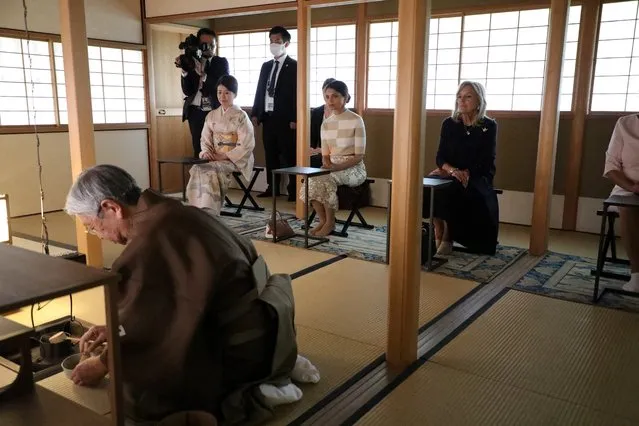 This handout photo taken and released by the Ministry of Foreign Affairs of Japan shows US First Lady Jill Biden (centre R) and other spouses during a visit to Uedaryu Wafudo for a tea ceremony presentation on the sidelines of the G7 Leaders' Summit in Hiroshima on May 19, 2023. (Photo by Ministry of Foreign Affairs of Japan/Handout via AFP Photo)