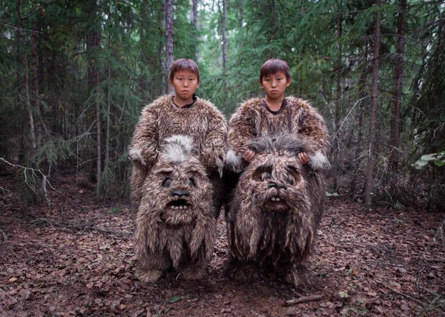 Contemporary issues – first prize, stories. Sakhawood. Twins Semyon and Stepan perform in the roles of dulgancha, mythical swamp creatures, in The Old Beyberikeen with Five Cows, in Sakha, Russia, on 9 August 2019. It is the first experience of participation in cinema for them. They travelled from their small village a few hundred kilometres away. (Photo by Alexey Vasilyev/World Press Photo 2021)