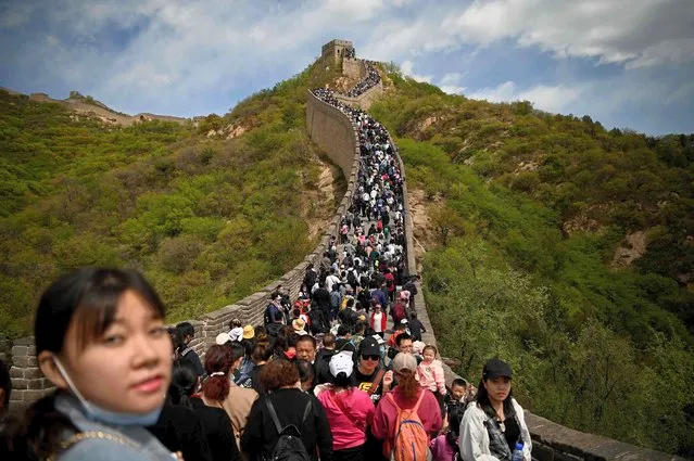 People visit the Great Wall during the labour day holiday in Beijing on May 1, 2021. (Photo by Noel Celis/AFP Photo)