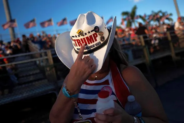 Supporters arrive to hear former US President and 2024 Republican Presidential hopeful Donald Trump speak at a rally at Ted Hendricks Stadium at Henry Milander Park in Hialeah, Florida, on November 8, 2023. (Photo by Ricardo Arduengo/AFP Photo)