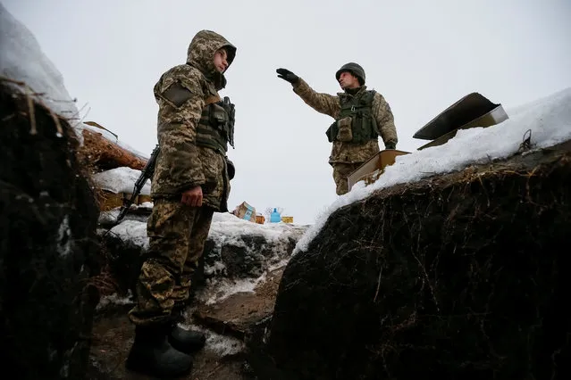 Ukrainian servicemen are seen at their position on the front line near the government-held industrial town of Avdiyivka, Ukraine February 4, 2017. (Photo by Gleb Garanich/Reuters)