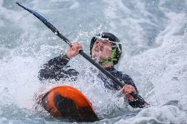 British Oscar Wyllie competes in the men's kayak cross junior time trial race during the Slalom & Kayak Cross Selection Series, at Lee Valley White Water Centre, in Waltham Cross, north of London, on April 1, 2024. (Photo by Adrian Dennis/AFP Photo)