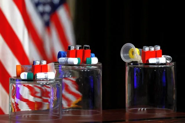Asthma inhalers are displayed next to U.S. President Joe Biden during his remarks on lowering healthcare costs, in the Indian Treaty Room of the Eisenhower Executive Office building, at the White House complex in Washington on April 3, 2024. (Photo by Evelyn Hockstein/Reuters)