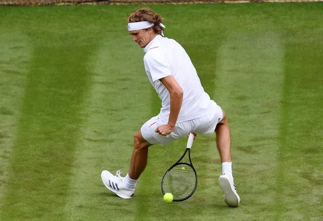 Germany's Alexander Zverev returns the ball to Czech Republic's Jiri Vesely during their men's singles first round match on the first day of the 2019 Wimbledon Championships at The All England Lawn Tennis Club in Wimbledon, southwest London, on July 1, 2019. (Photo by Toby Melville/Reuters)