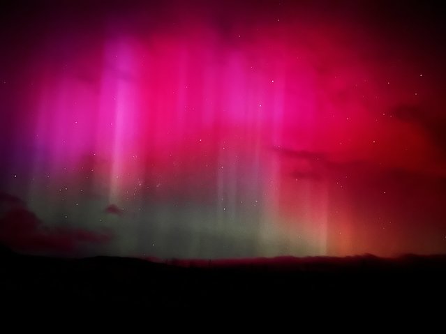 The aurora australis as seen near Ranfurly in Central Otago, South Island of New Zealand around 6:20 am NZT on May 11, 2024. (Photo by Andrew Dickson)