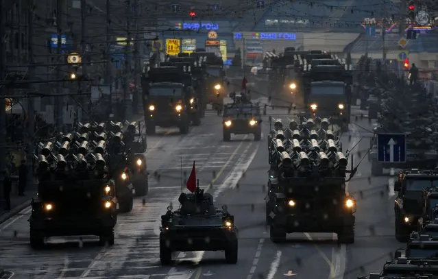 Russian military vehicles drive down Tverskaya Street in central Moscow on April 29, 2014, during rehearsals for the Victory Day military parade, which is held every year on May 9 to mark Russia’s victory over Nazi Germany in World War II. (Photo by Maxim Shemetov/Reuters)