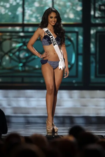 Miss New York, Thatiana Diaz, competes in the bathing suit competition during the preliminary round of the 2015 Miss USA Pageant in Baton Rouge, La., Wednesday, July 8, 2015. (Photo by Gerald Herbert/AP Photo)