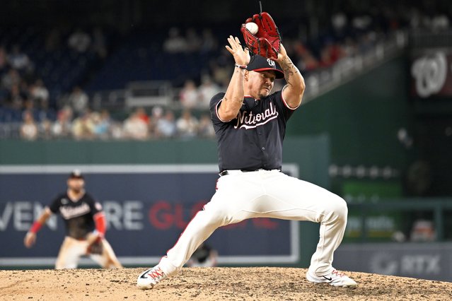 Washington Nationals infielder turned closing pitcher Ildemaro Vargas catches a line drive hit by San Diego Padres' Jake Cronenworth for the third out of the top of the ninth inning of a baseball game, Wednesday, July 24, 2024, in Washington. (Photo by John McDonnell/AP Photo)