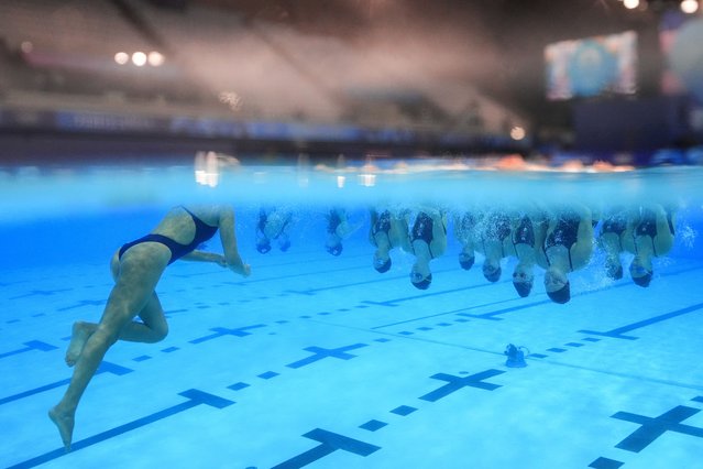 The Italian artistic swimming team do not aim to keep their heads above water in practice at Aquatics Centre in Saint-Denis, France on August 05, 2024. (Photo by Stefan Wermuth/Reuters)