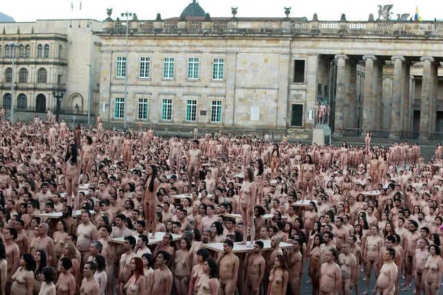 Naked volunteers pose for U.S. artist Spencer Tunick at Bolivar Square in Bogota,Colombia. June 5, 2016. (Photo by John Vizcaino/Reuters)