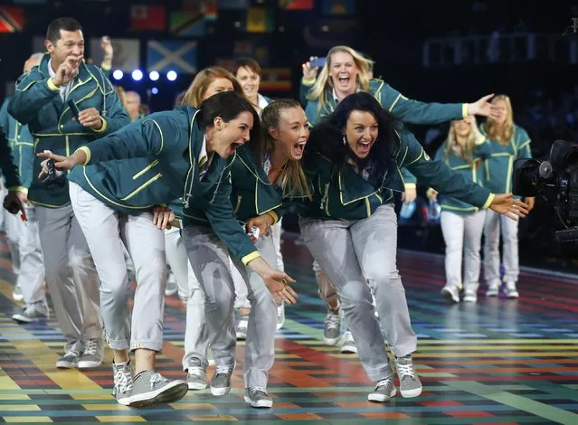 Members of Australia's team enter the stadium during the opening ceremony for the 2014 Commonwealth Games at Celtic Park in Glasgow, Scotland, July 23, 2014. (Photo by Phil Noble/Reuters)
