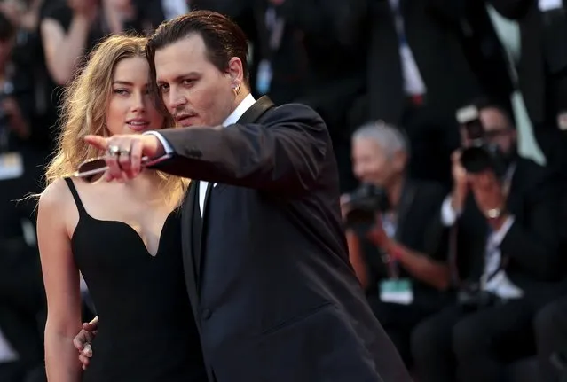 Actor Johnny Depp and his wife Amber Heard attend the red carpet event for the movie “Black Mass” at the 72nd Venice Film Festival in northern Italy September 4, 2015. (Photo by Manuel Silvestri/Reuters)
