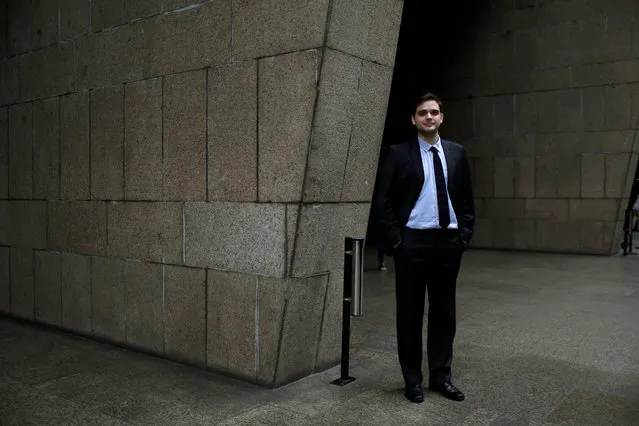 Antonio Mariano de Azevedo, a 25-year-old political advisor, poses for a portrait in Rio de Janeiro, Brazil, July 21, 2016. When asked what he felt about Rio de Janeiro hosting the Olympics, Antonio said, “Rio de Janeiro will not change after this event. For the government the Olympic infrastructure has been more important than investing in improved services for the population”. He also said, “I am against the Olympics, the city is in crisis”. (Photo by Pilar Olivares/Reuters)