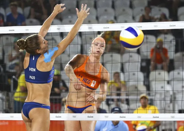 2016 Rio Olympics, Beach Volleyball, Women's Preliminary, Beach Volleyball Arena, Rio de Janeiro, Brazil on August 6, 2016. Madelein Meppelink (NED) of Netherlands and Olaya Pazo (VEN) of Venezuela compete. (Photo by Ruben Sprich/Reuters)