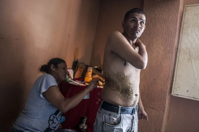 The known as “callejón de los brujos” has become an alternative for the sick in Venezuela. (Photo by Alvaro Fuente/NurPhoto via Getty Images)