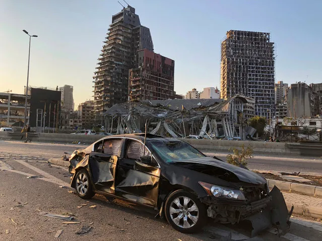 Damaged vehicle and buildings are pictured near the site of Tuesday's blast in Beirut's port area, Lebanon on August 5, 2020. (Photo by Issam Abdallah/Reuters)