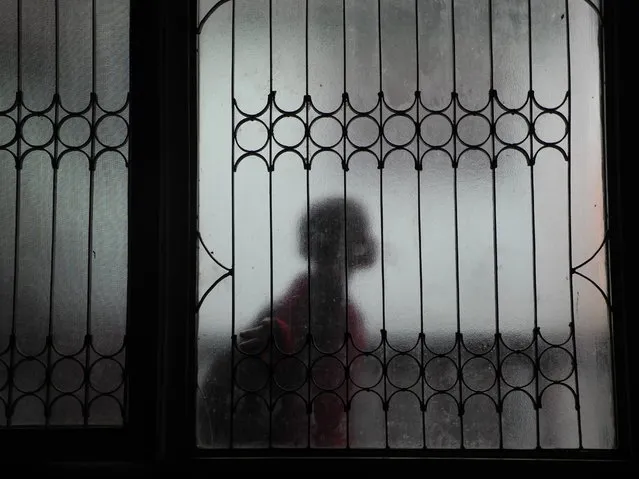 “Through the looking glass”. “Only in the darkness can you see the stars.” – Martin Luther King Jr. Photo location: Kathmandu, Kathmandu Valley, Nepal. (Photo and caption by Michele Gapp/National Geographic Photo Contest)