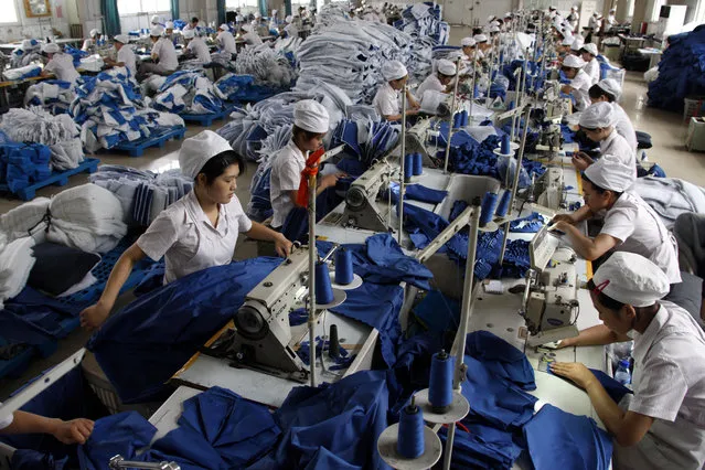 A production line of a garment factory in Huaibei, Anhui province. (Photo by Reuters/Stringer Shanghai)