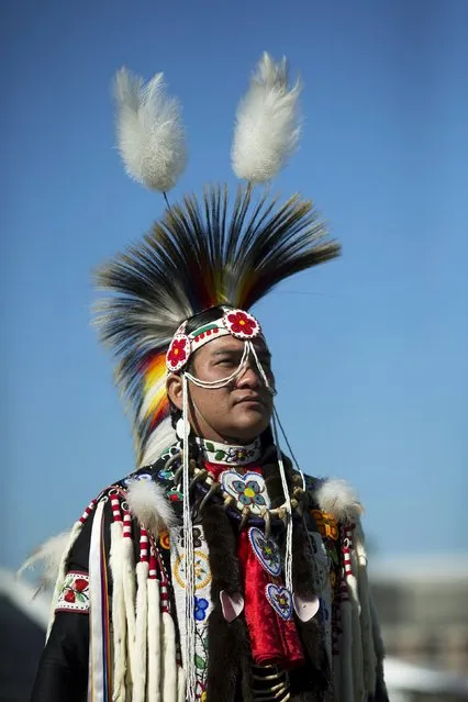 A reveller takes part in a "pow-wow" celebrating the Indigenous Peoples Day Festival in Randalls Island, New York, October 12, 2015. (Photo by Eduardo Munoz/Reuters)