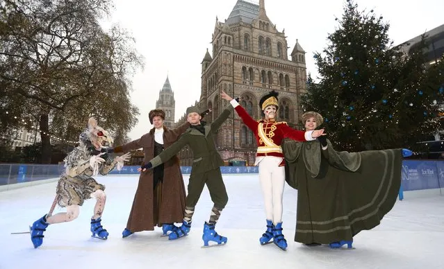 Members of the English National Ballets production of The Nutcracker (L-R) James Streeter, Josh McSherry-Gray, Grant Rae, Fernando Bufala and Yoko Callegari perform on ice at Natural History Museum on December 4, 2014 in London, England. Performances of The Nutcracker begin at The London Coliseum from December 11. (Photo by Tim P. Whitby/Getty Images)