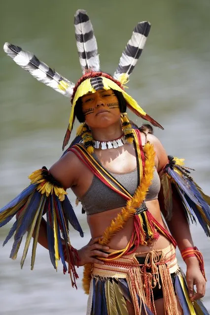 An indigenous woman from Kanela tribe poses for photos after participating in a parade of indigenous beauty during the first World Games for Indigenous Peoples in Palmas, Brazil, October 29, 2015. (Photo by Ueslei Marcelino/Reuters)