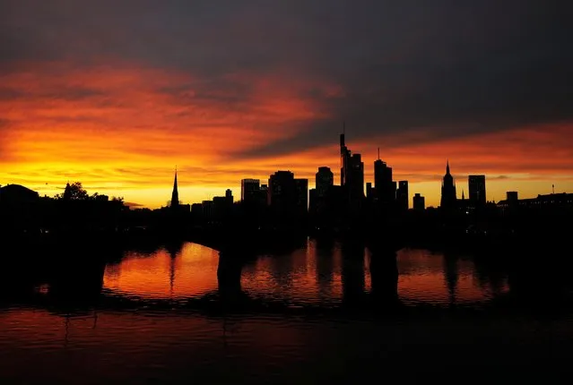 The skyline with its financial district is photographed during sunset as the spread of the coronavirus disease (COVID-19) continues in Frankfurt, Germany, October 26, 2020. (Photo by Kai Pfaffenbach/Reuters)