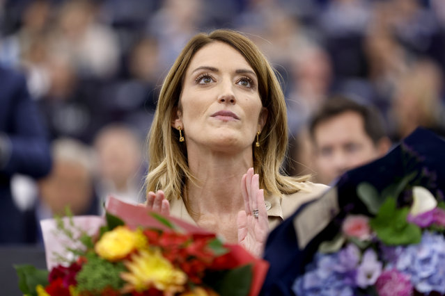 European Parliament President Roberta Metsola receives flowers during the opening plenary of the newly-elected European Parliament in Strasbourg, eastern France, Tuesday, July 16, 2024. (Photo by Jean-Francois Badias/AP Photo)