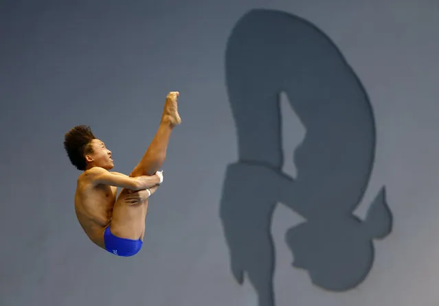 Malaysia's Bertrand Rhodict Lises in action during the men's platform final of the South-east Asian Games in Cambodia on May 11, 2023. (Photo by Kim Kyung-Hoon/Reuters)