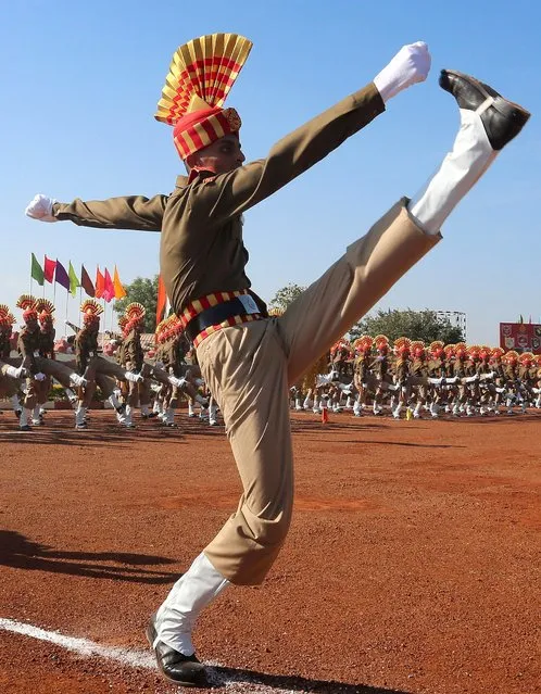 India's Central Armed Police Forces, Sashastra Seema Bal (SSB) personnel take part in a passing out parade at their training headquarters near Bhopal, India, 15 December 2015. (Photo by Sanjeev Gupta/EPA)