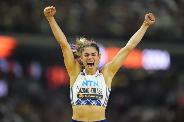 Auriana Lazraq-Khlass, of France celebrates after finishing heptathlon 200-meters during the World Athletics Championships in Budapest, Hungary, Saturday, August 19, 2023. (Photo by Petr David Josek/AP Photo)