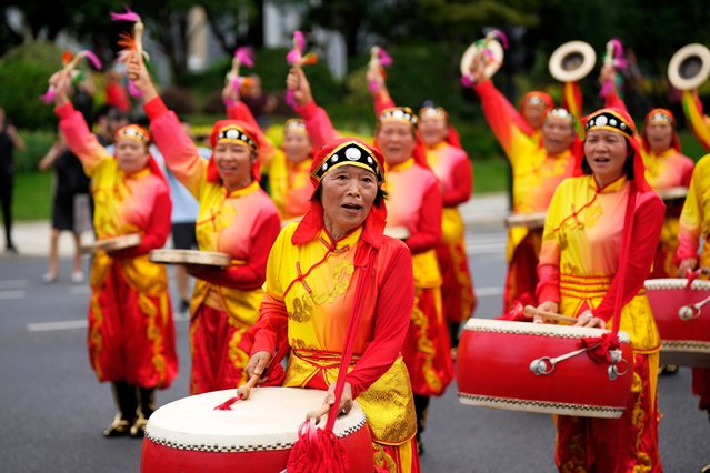 Drummers perform during the torch relay for the 19th Asian Games in Hangzhou, China, Wednesday, September 20, 2023. The Asian Games are set to go in China. It's the biggest multi-sport international event in the country since pandemic restrictions were lifted there about nine months ago. (Photo by Vincent Thian/AP Photo)