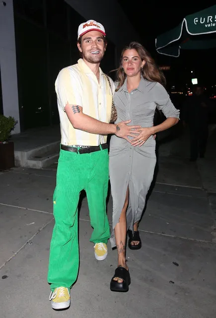 New Zealand actor Kj Apa and his pregnant wife Clara Berry make a rare sighting at Carter Gregory's birthday party at 40 Love in West Hollywood on June 20, 2021. (Photo by Backgrid USA)