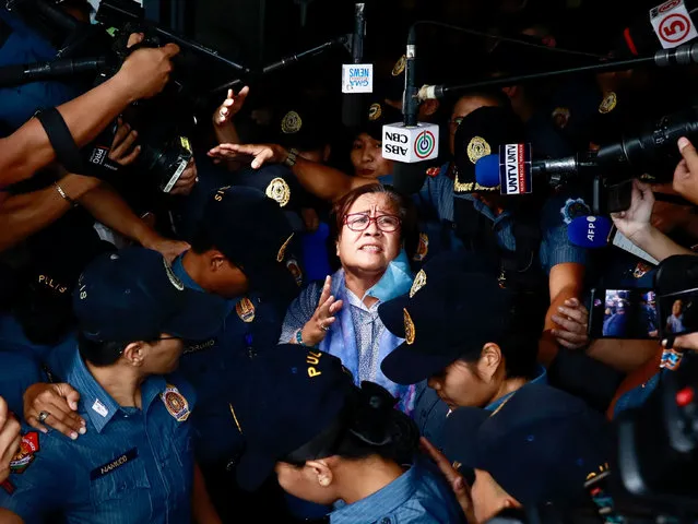 Former senator Leila De Lima (C) reacts after attending a court hearing in Muntinlupa city, Metro Manila, Philippines on November 13, 2023. A Regional trial court has granted detained former senator Leila de Lima's bail plea for her temporary liberty. De Lima, a staunch critic of former president Rodrigo Duterte, has been detained inside the Philippine National Police headquarters for the past six years facing drug-related charges. (Photo by Francis R. Malasig/EPA/EFE)