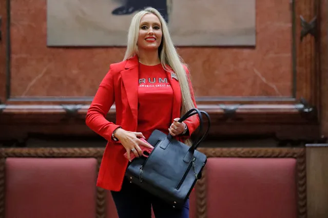 A woman models the Trudy Concealed Carry Handbag by Hiding Hilda during the “Fashion & Firearms” concealed carry fashion show at the National Rifle Association (NRA) annual meeting in Indianapolis, Indiana, U.S., April 27, 2019. (Photo by Lucas Jackson/Reuters)
