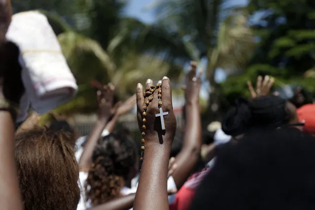 A group of over 250 women march through the center of Bujumbura, Burundi, calling for the release of protesters arrested during demonstrations, Sunday May 10, 2015. (Photo by Jerome Delay/AP Photo)