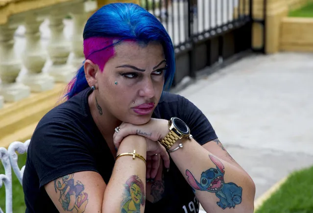 In this June 28, 2019, photo, Dianelys Alfonso, singer whose voice won her the label “Goddess of Cuba” sits during an interview with The Associated Press in Havana, Cuba. She became the center of a new phenomenon in Cuba when she publicly denounced another renowned musician, flutist and bandleader José Luis Cortés, accusing him of repeatedly hitting and raping her during her time as vocalist for NG La Banda, one of the best-known Cuban bands of the last three decades. (Photo by Ismael Francisco/AP Photo)