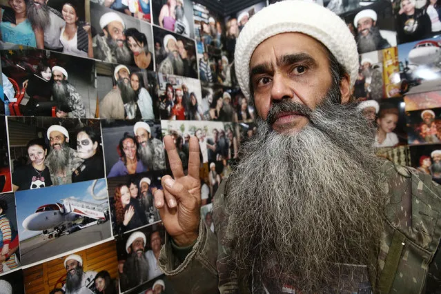 Osama bin Laden lookalike Ceara Francisco Helder Braga Fernandes poses in his “Bar do Bin Laden” on April 29, 2014 in Sao Paulo, Brazil. Braga says he was known as the “Beard Man” before 9/11 but became known as a Bin Laden lookalike following the 9/11 attacks. He says he is Christian and continues to play the role to support his business. (Photo by Mario Tama/Getty Images)