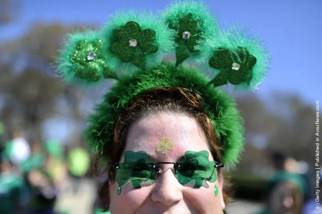 Darcy Zimmermann wears her green sunglasses and headband during the St. Patrick's Day parade on March 17, 2012 in Chicago