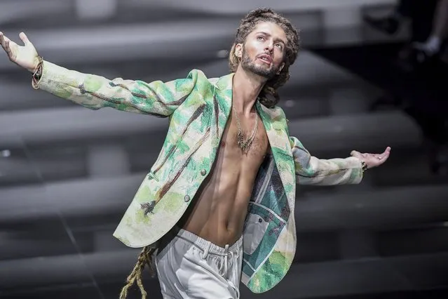 A model wears a creation as part of the Emporio Armani men's Spring Summer 2023 collection presented in Milan, Italy, Saturday, June 18, 2022. (Photo by Nicola Marfisi/AP Photo)