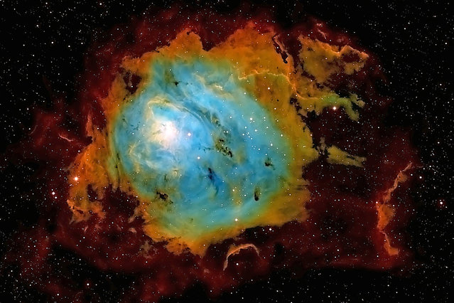 Lagoon Master. These amazing pictures of nebula thousands of light years from Earth have been captured by an amateur astronomer Dr. Dennis Roscoe snapped the beautiful celestial formations from his own personal observatory. His telescope looks into deep space at the nebula, which show both the birth and death of stars, like our very own Sun. (Photo by Dennis Roscoe/Caters News)