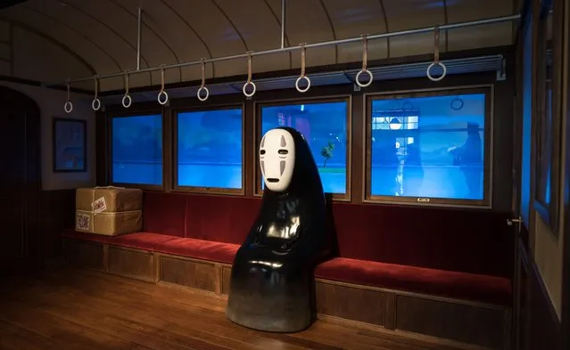 A display of Kaonashi or No-Face, an animation character from the film “Spirited Away”, that is copyrighted by Studio Ghibli, is seen in the Ghibli's Grand Warehouse area during a preview for the Ghibli Park on October 12, 2022 in Nagakute, Japan. The theme park, which features Studio Ghibli animations, opens on November 1 in the Expo 2005 Aichi Commemorative Park. (Photo by Tomohiro Ohsumi/Getty Images)