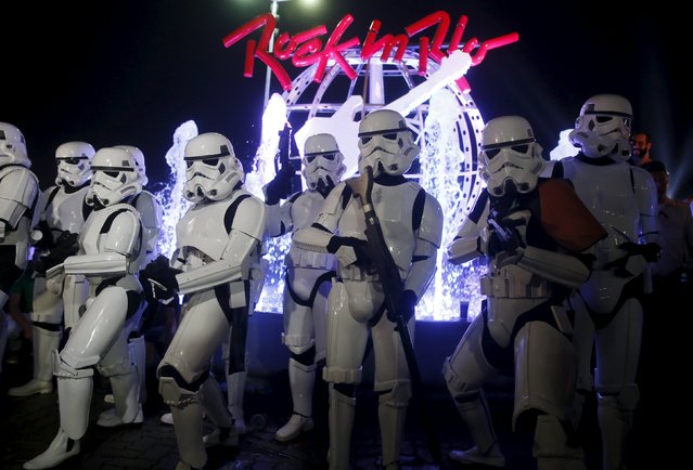 People dressed up as stormtroopers from the Star Wars movies pose for photos during the Rock in Rio Music Festival in Rio de Janeiro, Brazil, September 19, 2015. (Photo by Pilar Olivares/Reuters)